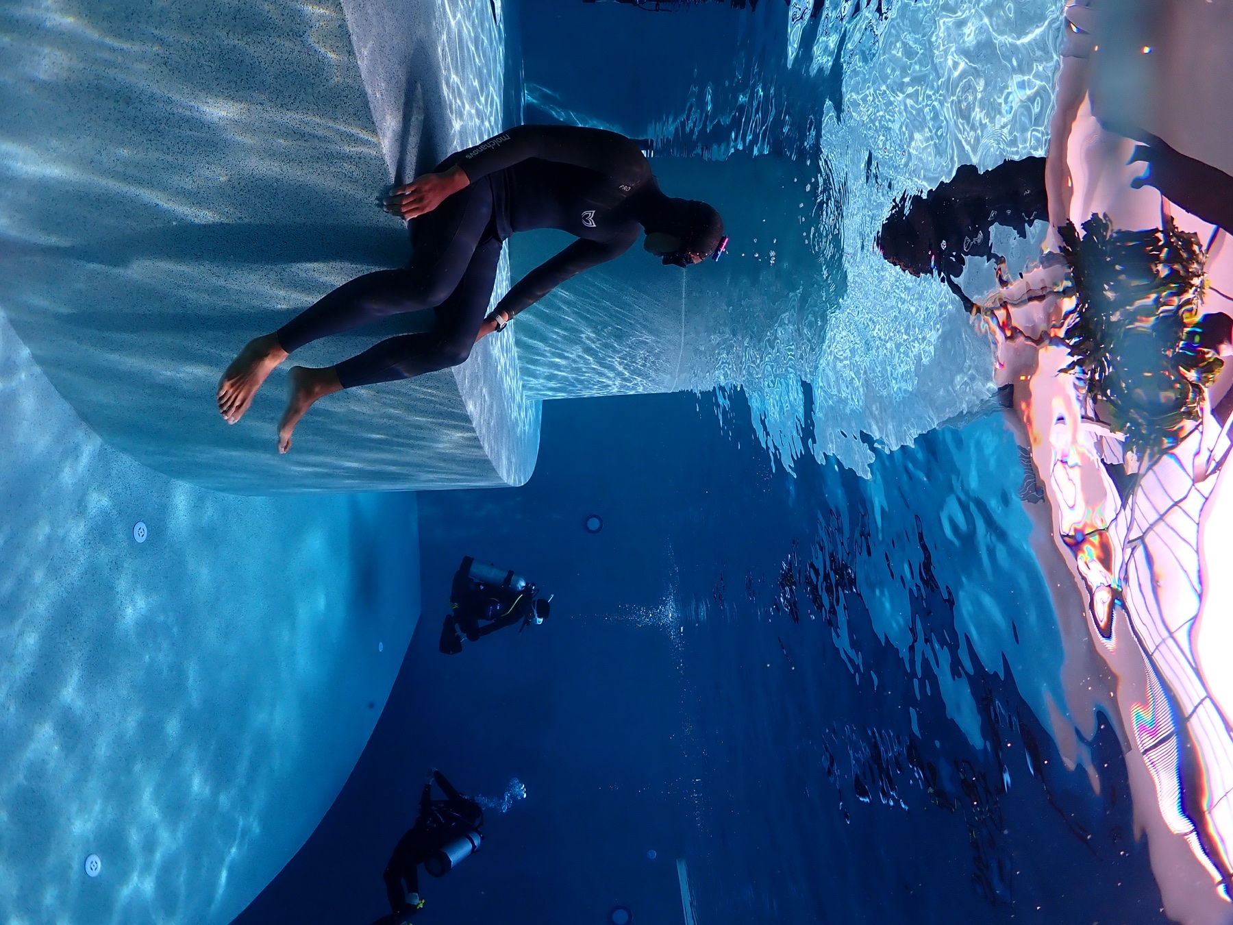 Freediver relaxing during a controlled deep-pool session